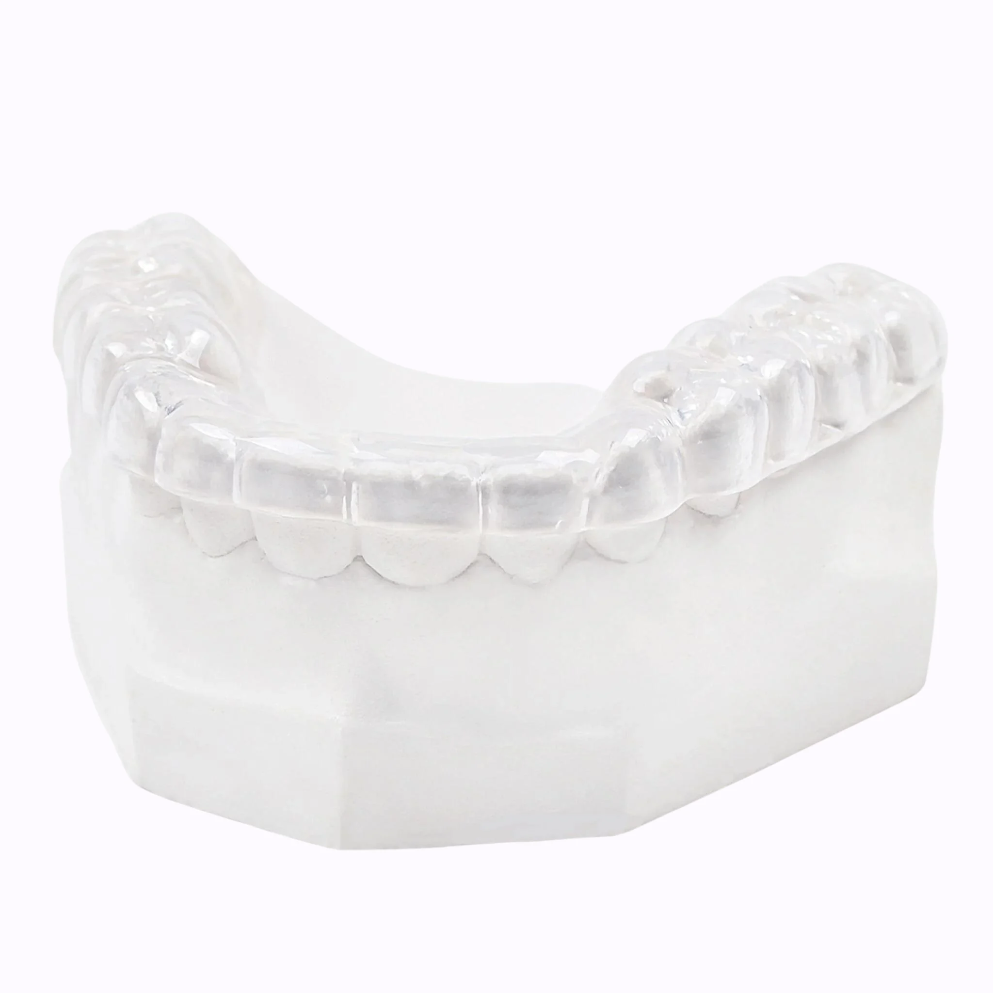 Clear night guard on a dental model.