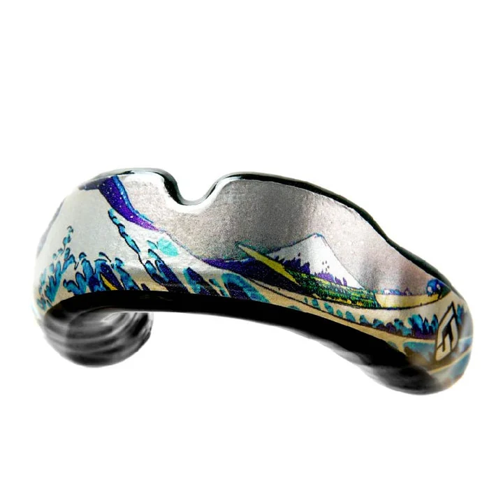 Blue, green, and silver custom sports mouthguard artwork.